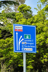 Traffic direction sign in Geneva: highway, Lausanne, airport...