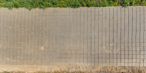 top view of the texture of paving slabs on pedestrian path - 786678140