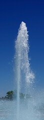 Water Fountain Shooting High into Blue Sky
