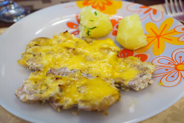 A comforting meat dish featuring creamed with potatoes on a plate, made from fresh produce and ingredients, perfect for a cozy meal