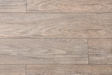 New wooden laminate in room. Closeup