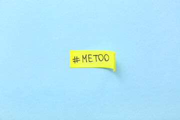 Sticky paper with hashtag METOO on blue background