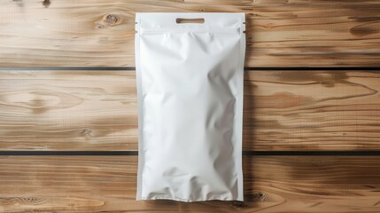 white packaging bag with header seal, mockup, on a wooden table, top view, 16:9