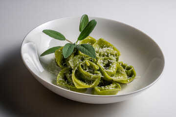 Pasta Bowl of green ravioli with sage and parmesan