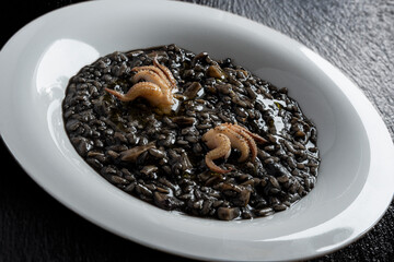 Dish of risotto with squid ink