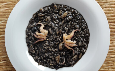 Dish of risotto with squid ink