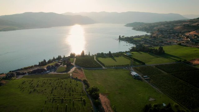 Small Town Farms Drone Shot with Lake Chelan Background