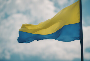 Yellow blue flag of Ukraine against the sky copy space