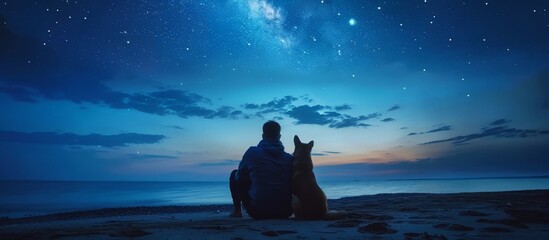 Man and german shepherd admire night sky on coastal beach, traveller with dog enjoying starry night