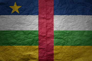 big national flag of central african republic on a grunge old paper texture background
