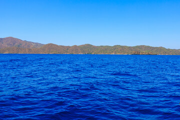 View of the sea from an excursion yacht. Background with selective focus and copy space
