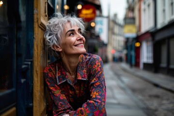 Portrait of a beautiful senior woman with short gray hair in the city.