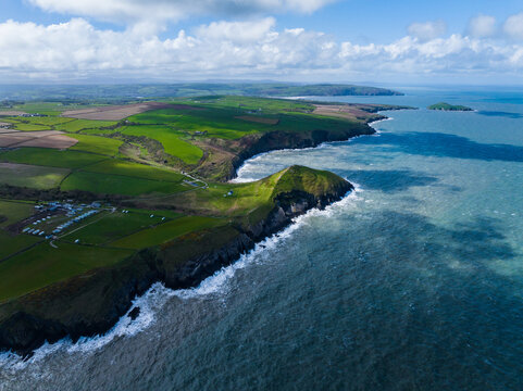 Aerial shot of Welsh coastline at Mwnt with cliffs and beach