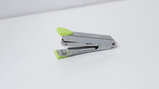 The stapler is photographed on a white background