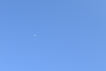 Moon in a Blue Sky