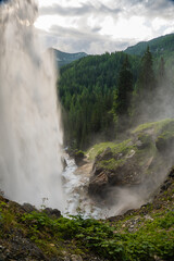  waterfall. water flow down.Streams of water crash on rocks and boulders. stormy stream of water with drops and splashes.Downward movement of water. - 786742723