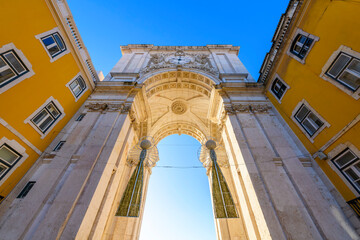 The historic Arco da Rua Agusta arch on Praça do Comércio square in the Baixa city center...