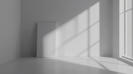 Fototapeta na wymiar Modern minimalist interior with sunlight casting geometric shadows through a window onto a plain wall.