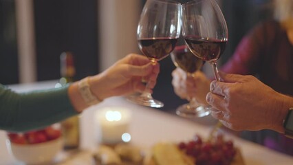 Dinner party or celebration with different kinds of appetizers and red wine