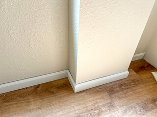 Installing Vinyl Baseboards in a Modern Home Renovation Project - 786757736