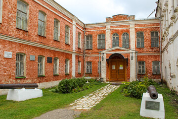 Old cannon on the background of Art Gallery in Goritsky Uspensky monastery