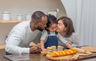 Multiracial Family Spending Quality Time Together Baking Bread in a Cozy Kitchen Setting