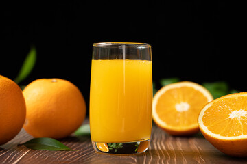 Fresh Orange Juice in a Glass on table.