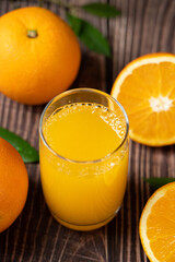 Fresh Orange Juice in a Glass on table.