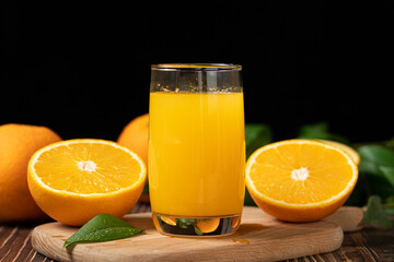 Fresh Orange Juice in a Glass on table.