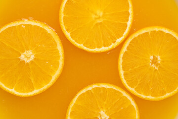 Orange slices in orange juice.Refreshing citrus fruit.