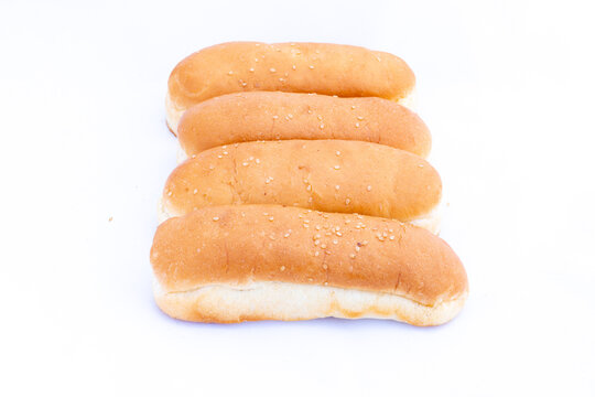 Whole grain hot dog buns on white background