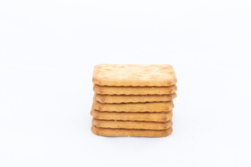 Stack of crackers biscuits isolated on a white background with copy space.