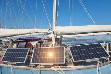 solar panes on sailing boat electric power sea blue sun