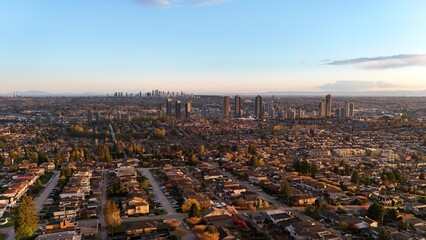 Beautiful sunset over the skyline of Burnaby in the Lower Mainland during a spring season in...