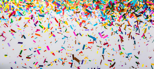 Falling letters of English language colorful Confetti Celebration of Joy Confetti flying colors exploding happiness everywhere  white background.