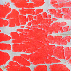 Close up of lack old red leather seat .Abstract background of torn old leather sofa for design usage purpose.