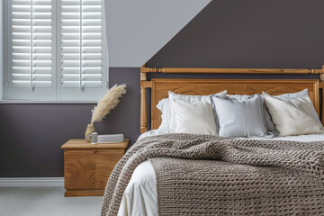 Serene bedroom with minimalist elegant decor and natural light. Interiors composition.