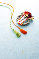 正月飾りと組紐と和紙の和風イメージ