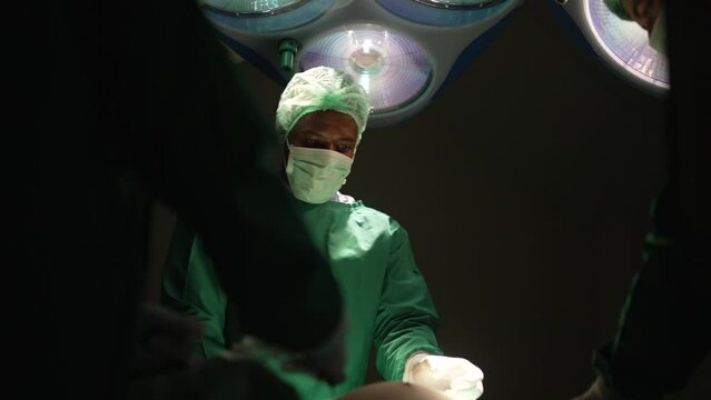 Surgeons work at operating room.