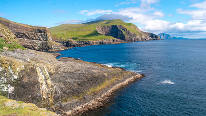 Mykines, Faroe Islands. Panoramic view of Mykines island, bird watching destination for puffins. Fjords landscape and seascape