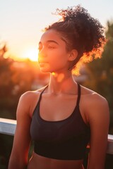 Pausing During Rooftop Workout at Sunset in Urban Setting