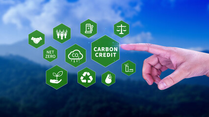 Green energy, Carbon credit market concept, Businessman pointing Carbon credit icon, Net zero,...