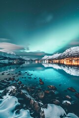Spectacular Aurora Borealis Over Snow-Capped Mountains And Reflective Lake At Night