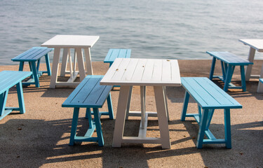Wooden benches on the seashore