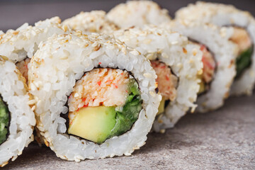 delicious fresh sushi roll with crab cucumber and avocado