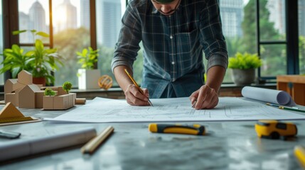 An architect meticulously examines construction blueprints on a desk within a sleek, contemporary office space. AIG41 - obrazy, fototapety, plakaty