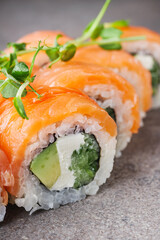 delicious fresh sushi roll philadelphia cheese with salmon eel cucumber and avocado