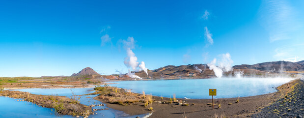 Panoramic over geothermal active zones with power plants in Iceland, near Myvatn lake, summer and...