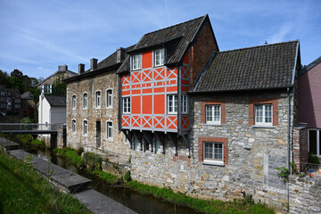 Row of istoric town houses on the Inde river in Kornelimuenster in the Eifel region