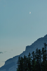 Twilight Moonrise over Mountain Silhouette